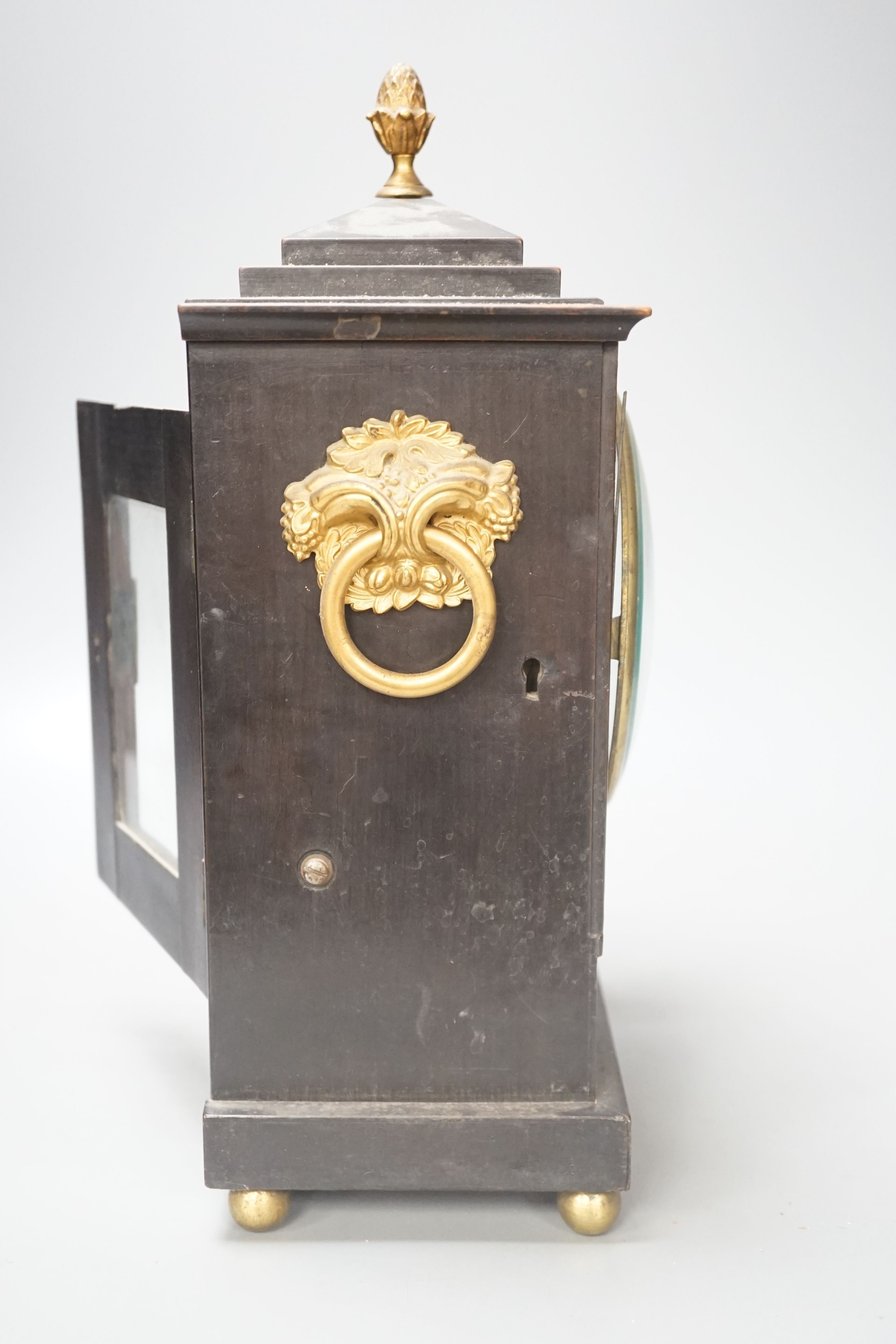 A Regency ebonised and brass inlaid bracket clock, by Rossiter, Bridgwater, 32cm